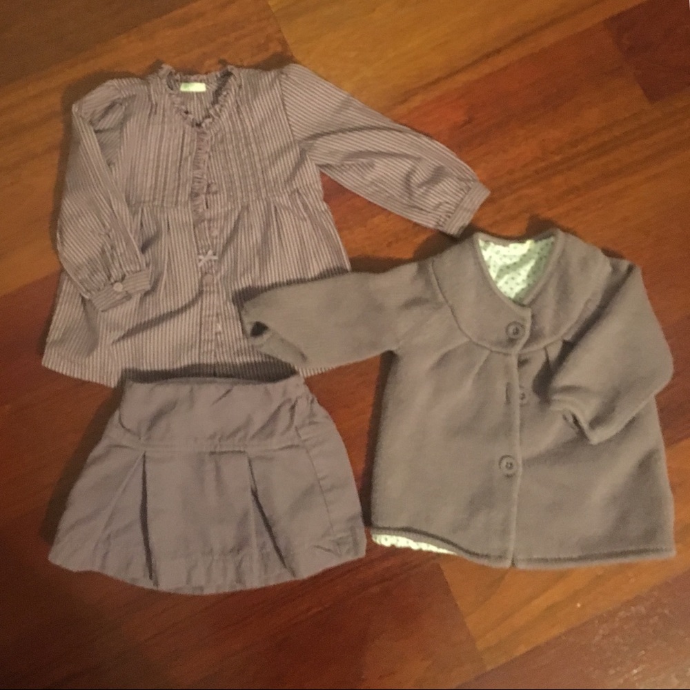 Purple baby sweater, blouse and skirt set.